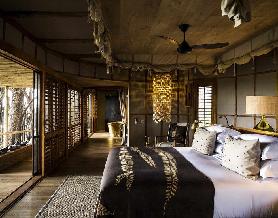 Rustic bedroom with natural textures and warm lighting.