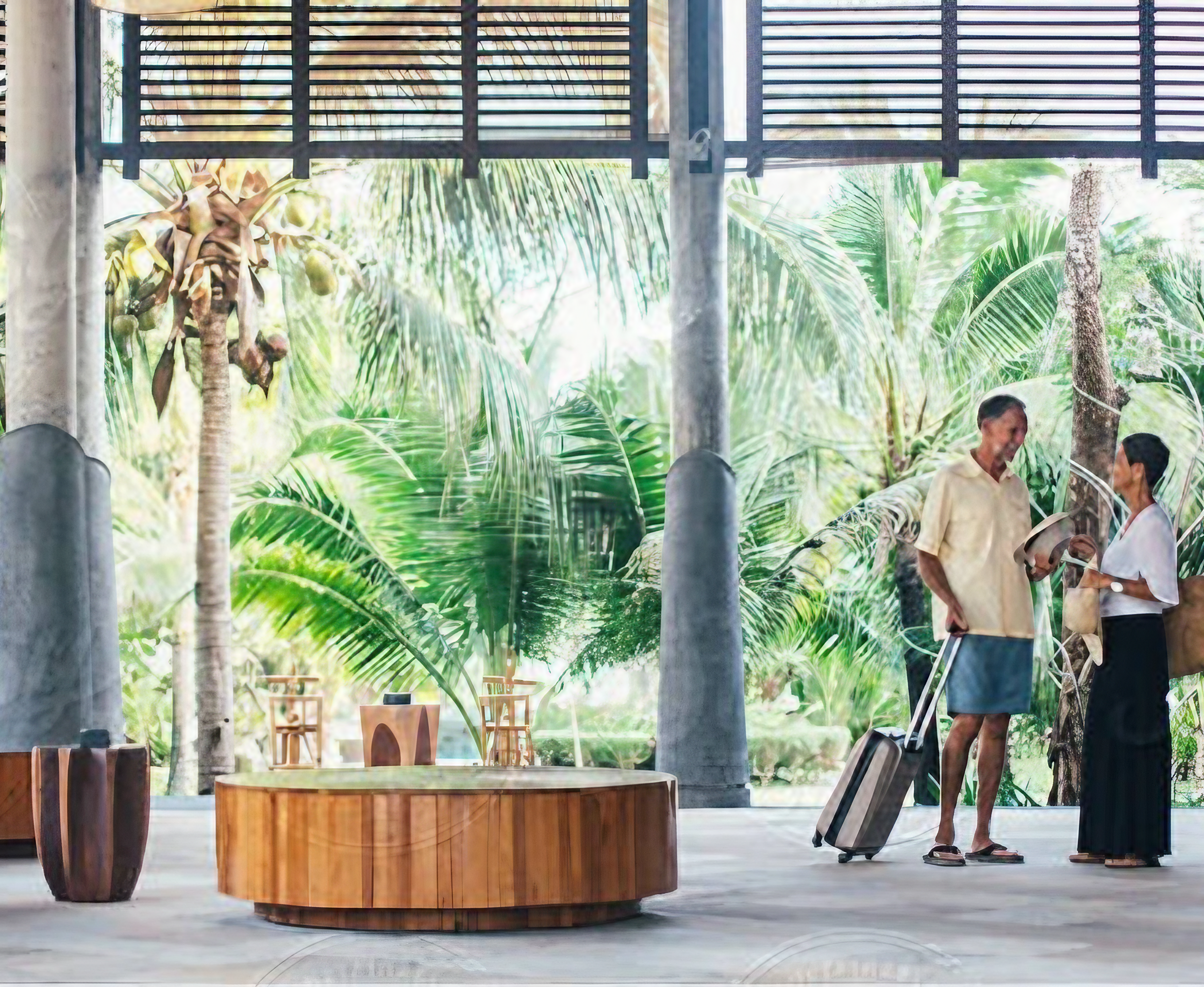 Man walking dog outside a modern patio surrounded by tropical plants.
